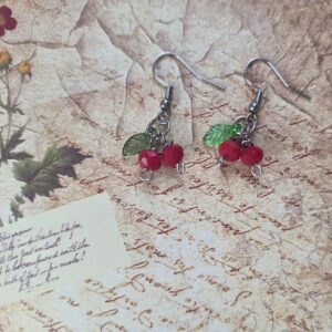 Handmade tiny cherries with leafs
