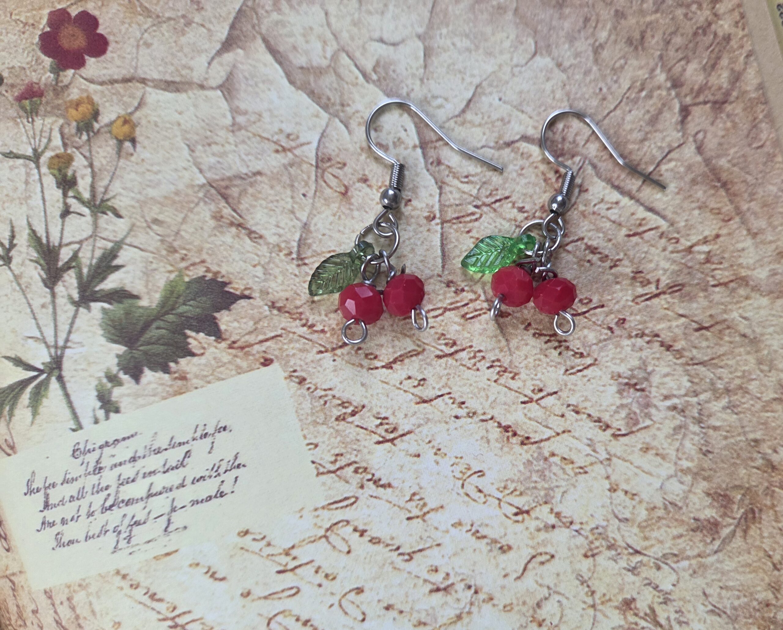 Handmade tiny cherries with leafs